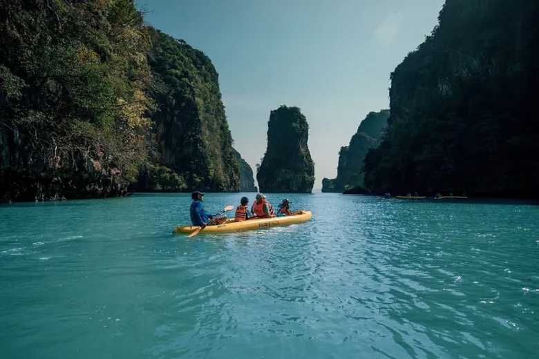 Step into the Jurassic World with John Gray's Sea Canoe, Explore the Natural Beauty of Phang Nga Bay and Experience the Glowing Bioluminescent Plankton at Night